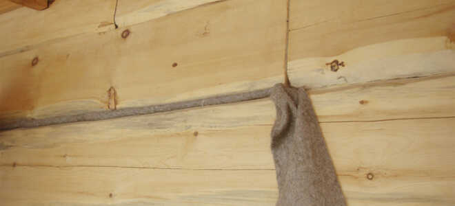 Конопатка дома из бруса